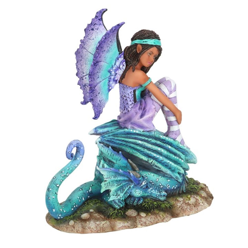 Dragon Perch Fairy Figurine by Amy Brown. Based on the ‘Dragon Perch’ watercolour painting by fantasy artist Amy Brown. This image shows the left view of the figurine. You can see the large fan like ears of the teal and blue sleeping dragon and the detailing in the dress of the fairy.  Officially Licensed For Sale at Mrs Reed's Emporium & Atelier.